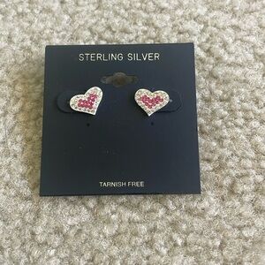 Sterling sliver heart earrings. Brand new